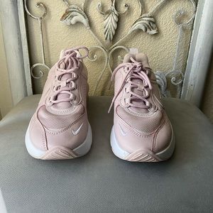 Nike size 7. Light pink. Worn a few times. Great condition.